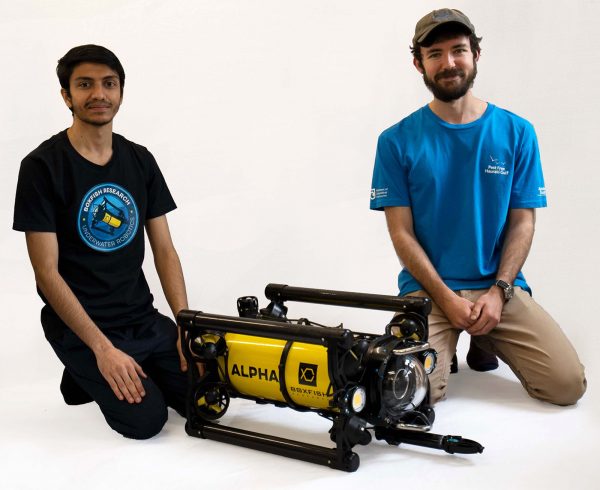 A photo of Pransh and Matt pictured with the Boxfish Alpha